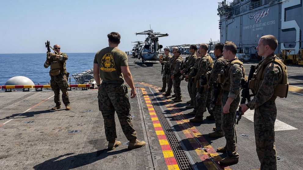 PHOTO: Maritime Special Purpose Force Marines, assigned to the 26th Marine Expeditionary Unit Special Operations Capable on the flight deck of the USS Bataan in the Mediterranean Sea, July 26, 2023.
