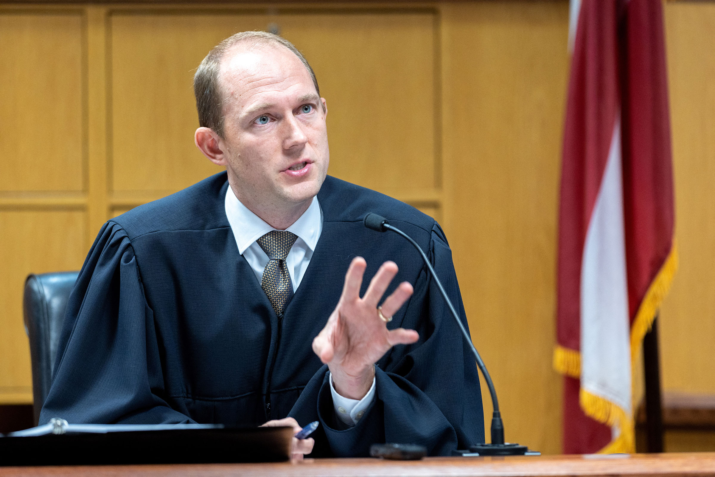Judge Scott McAfee presides over a hearing regarding media access in the case against former President Donald Trump and 18 others at the Fulton County Courthouse in Atlanta on Thursday, August 31.