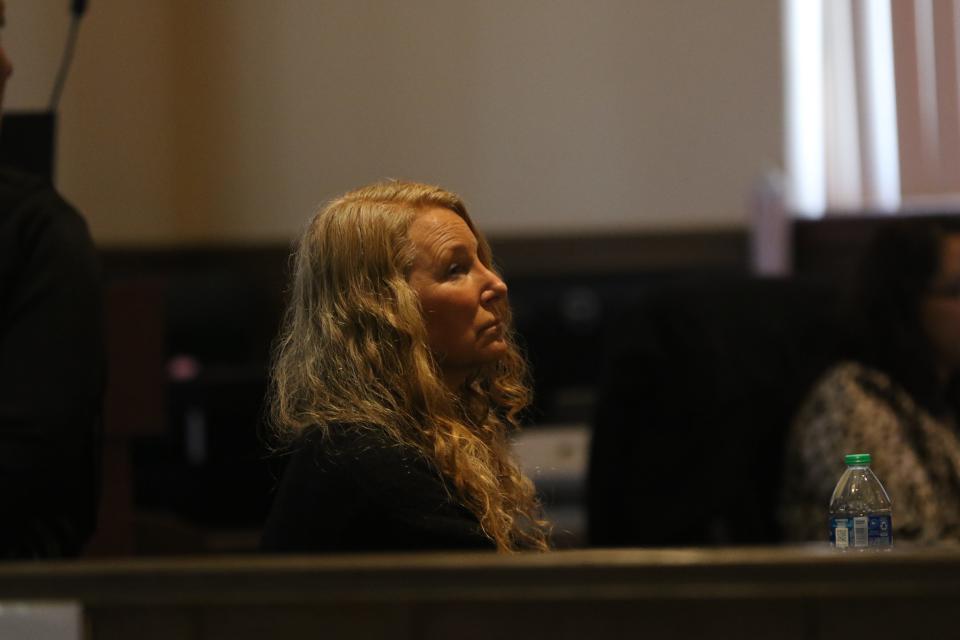 Kelli Smith listens to motions during her child abuse trial Nov. 6, 2023 in Eddy County District Court.