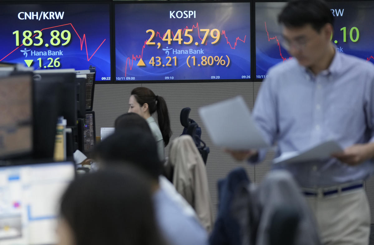 Asian shares rise after eased pressure on bonds pushes Wall Street higher